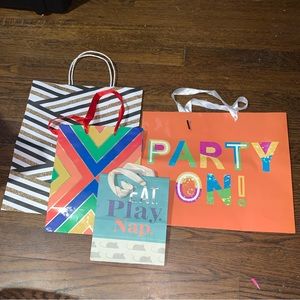 Four paper gift bags NWOT